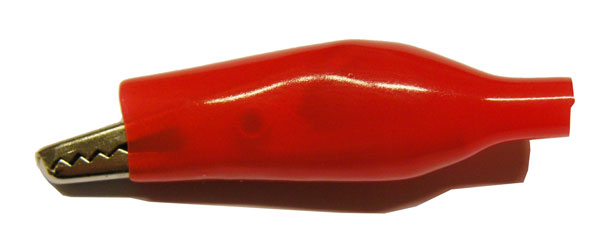 Pinza cocodrilo roja aislada mediana
